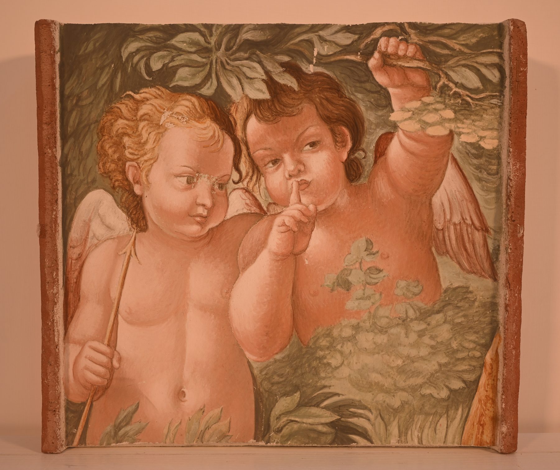 Fresco of two winged putti photographed before calibration, with a warm pink colour cast